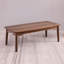 Table basse à quatre pieds en bois massif
