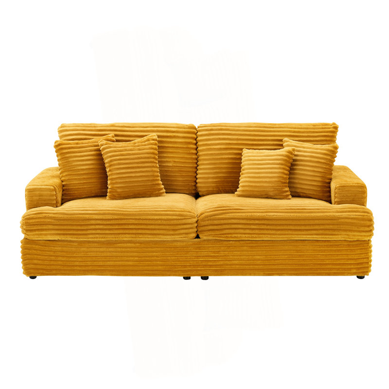 Canapé 88,58 po en velours côtelé 3 places, spacieux et confortable. Jumelé à 4 coussins décoratifs de la même couleur, il ajoute une touche d'élégance à un salon moderne. Orange