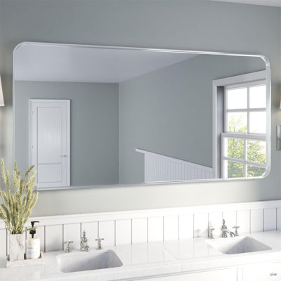 Élégant miroir encadré en aluminium avec coin arrondi pour une décoration intérieure élégante