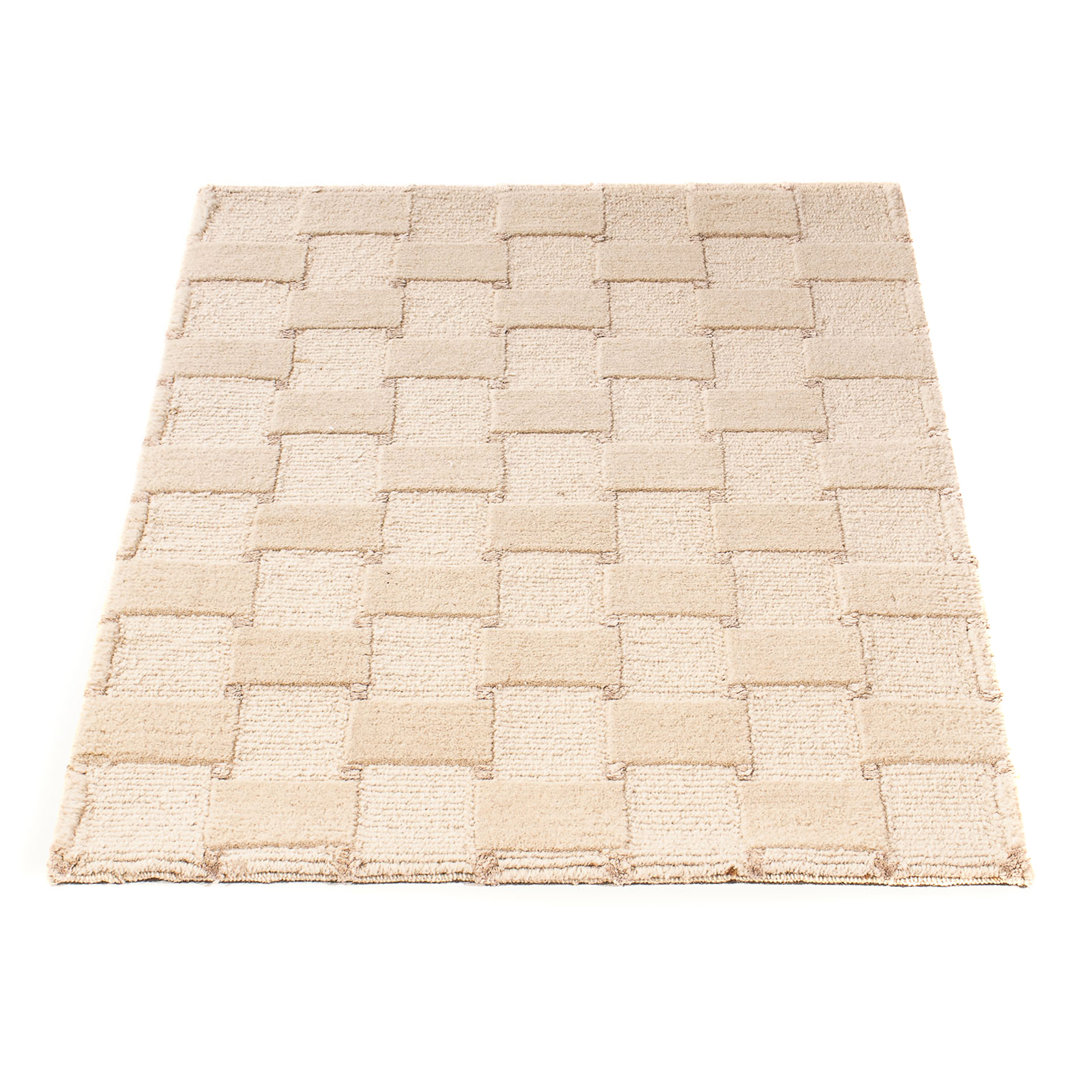 Handgefertigter Teppich Jarieliz aus Wolle in Beige