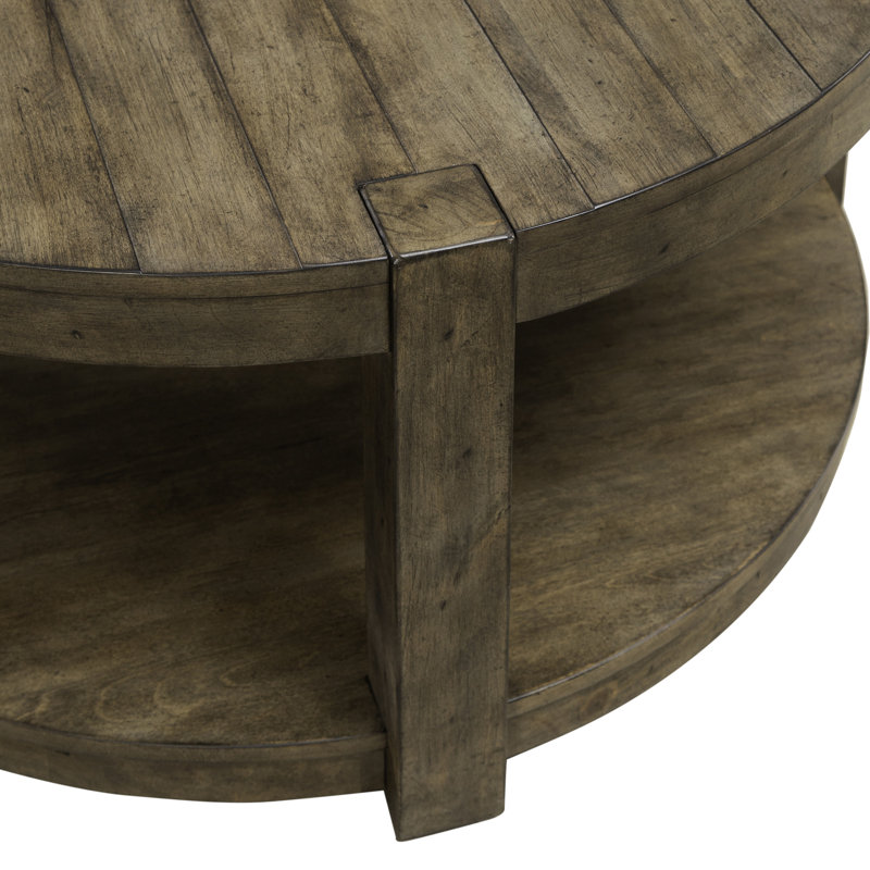 Arnaline Round Cocktail Table w/ Floor Shelf