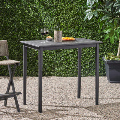 Table d'extérieur minimaliste gris foncé, en bois, mesurant 40,00 pouces de hauteur, finition nécessaire à l'assemblage, 41 po de hauteur