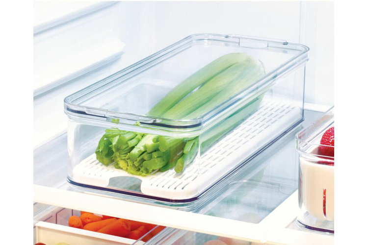 asparagus in a fridge bin
