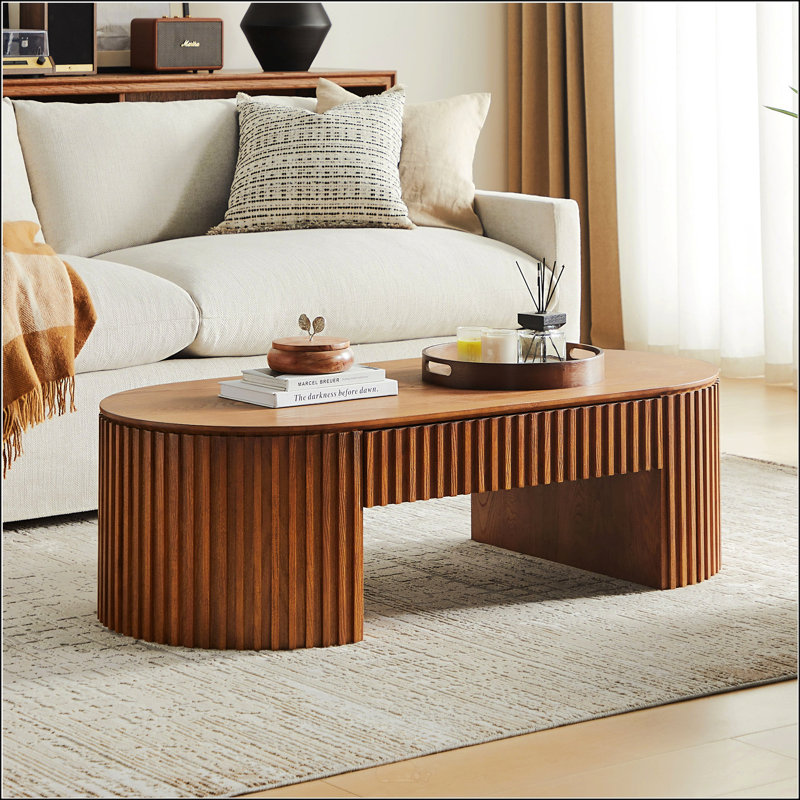 Table basse Mid-Century moderne en bois ovale avec tiroir spacieux, idéale pour un décor de salon élégant et fonctionnel.