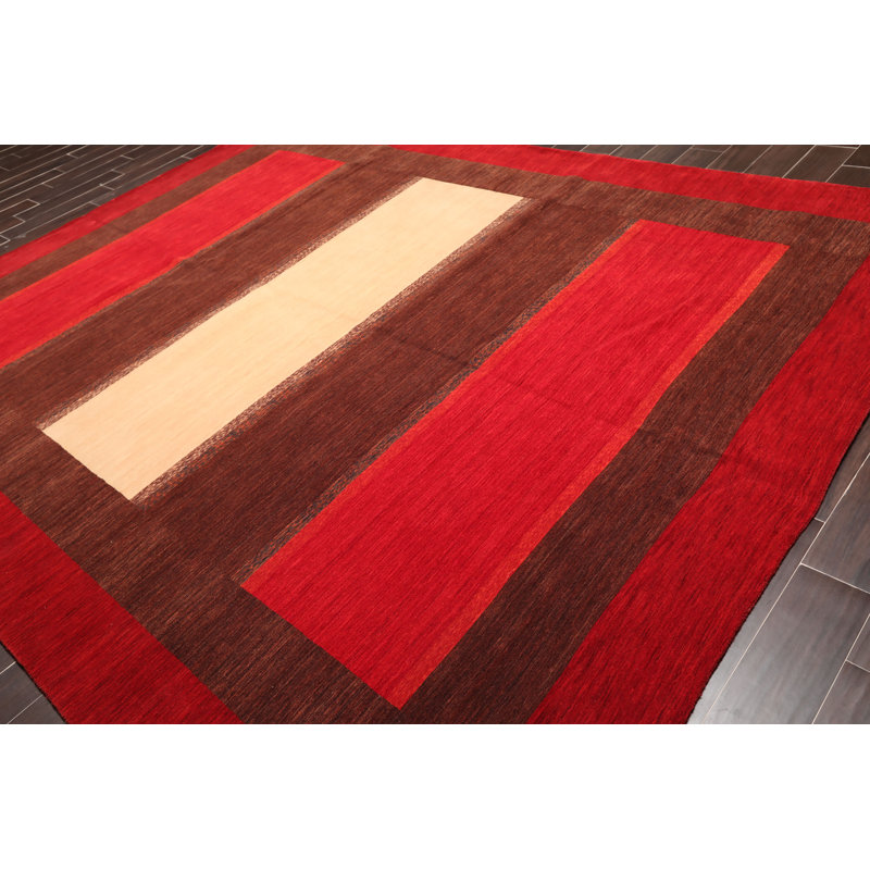 Tapis rouge en laine noué la à la main
