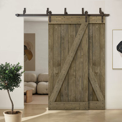 Porte de grange à panneaux et en bois avec quincaillerie d'installation