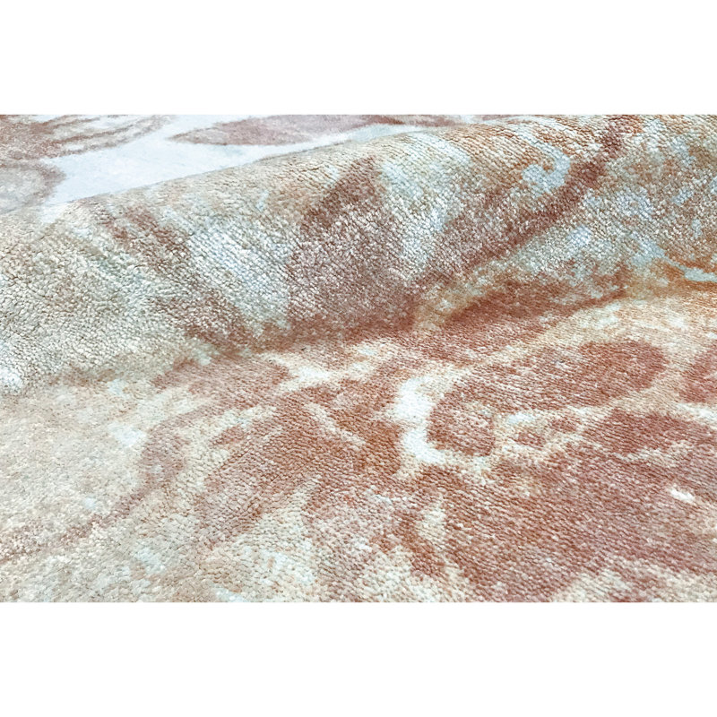 Floral Area Rug in White/Rust