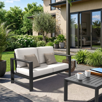 Causeuse d'extérieur Oltjana avec coussins Sunbrella®