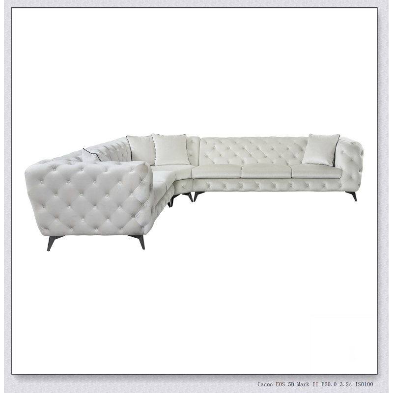 Canapé modulaire en tissu beige avec 4 coussins Atronia