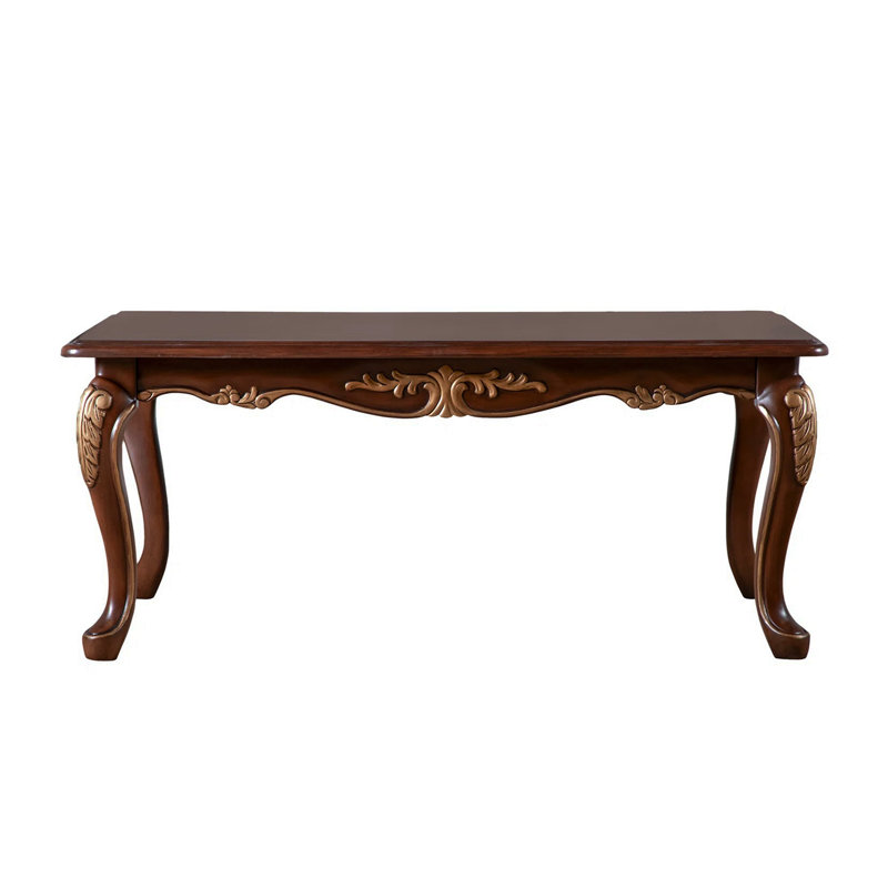 Table basse en bois avec détails sculptés en tabac riche