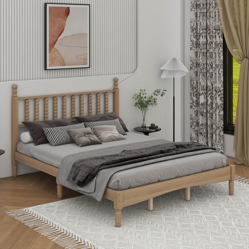 Grand lit plateforme en bois avec tête de lit en forme de gourde