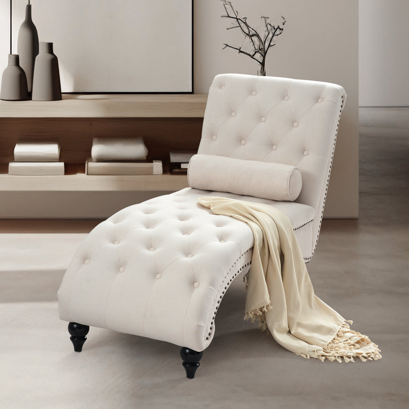 Chaise longue capitonnée avec coussin lombaire