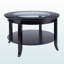 Table basse circulaire à quatre pieds Sienna
