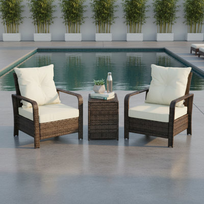 Table et chaises en osier, ensemble de meubles de patio 3 pièces avec rangement et coussins confortables pour la détente en plein air