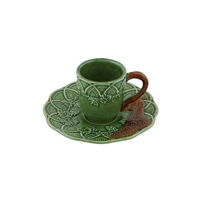 Bois, tasse à café et soucoupe faisan