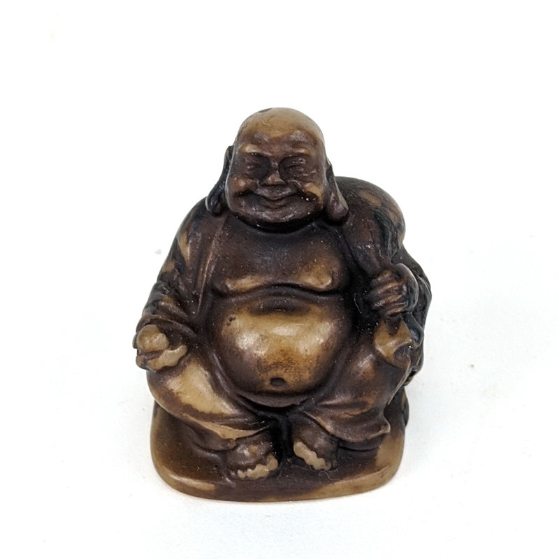 Figurine Hotai en résine assise avec sac