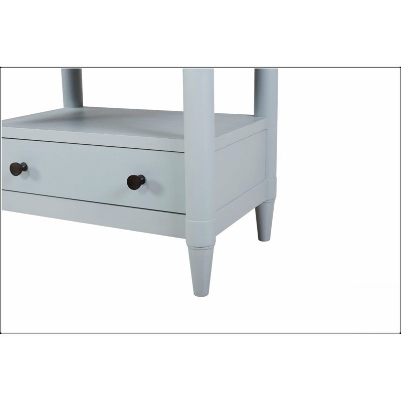 Table de chevet compacte à finition océan avec 2 tiroirs, parfaite pour les chambres modernes et peu encombrantes.