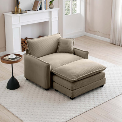 Canapé profond avec repose-pieds et coussin