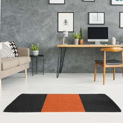 Tapis orange/noir