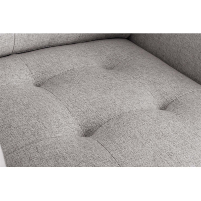 Fauteuil en tissu capitonné Victoria