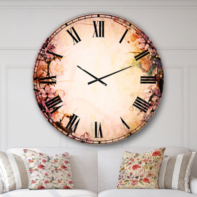 Sakura rose sur fond flou - horloge murale traditionnelle