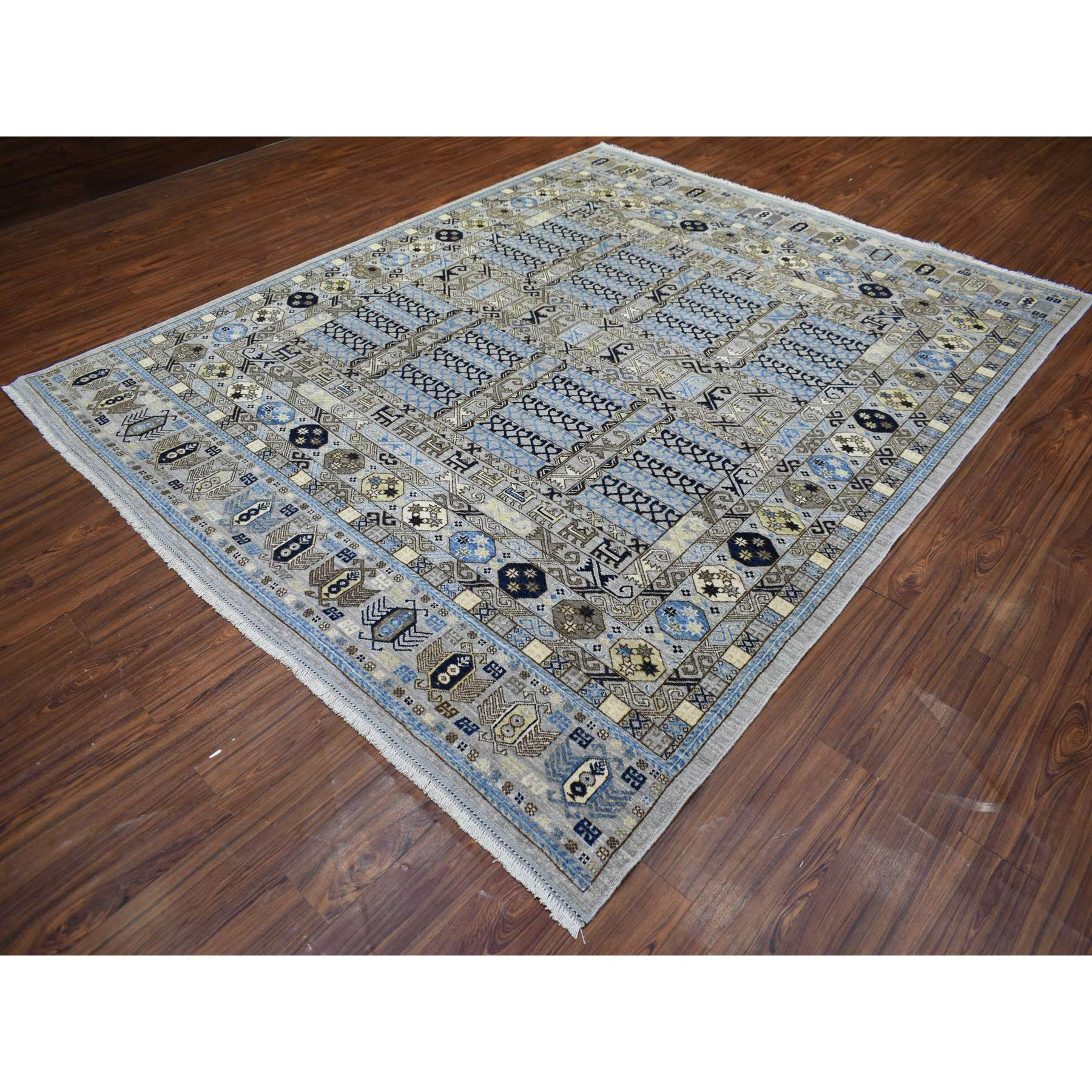 https://assets.wfcdn.com/im/82567468/compr-r85/2130/213029887/tameer-one-of-a-kind-rectangle-83-x-10-new-age-area-rug-in.jpg