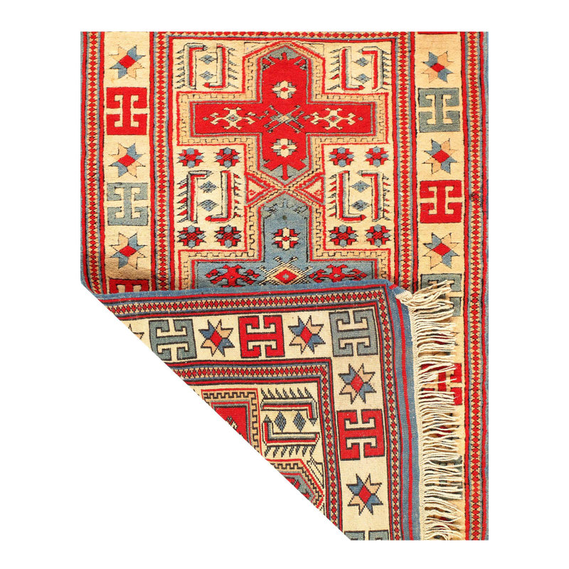 Miski Geometric Area Rug in Rust