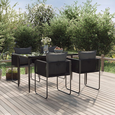Shey 4 - Person Wicker Patio Dining Set with Rectangular Table