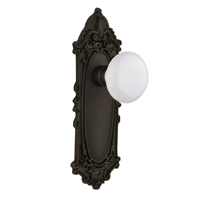 Plaque victorienne avec bouton de porte en porcelaine blanche, Bronze frotté à l'huile, 2,375 po