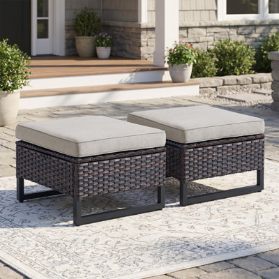 Repose-pieds de patio extérieur en osier avec coussin Ingvald (ensemble de 2)