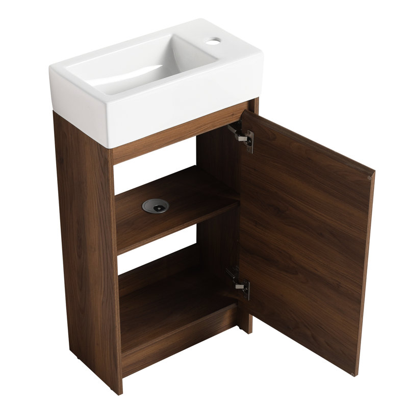 Meuble-lavabo autoportant de 18 pouces avec lavabo simple. Cabinet de caractère délicat. Lavabo en céramique. Bois d'ébène brun pour portes de salle de bain à fermeture en douceur. Petits espaces de bain
