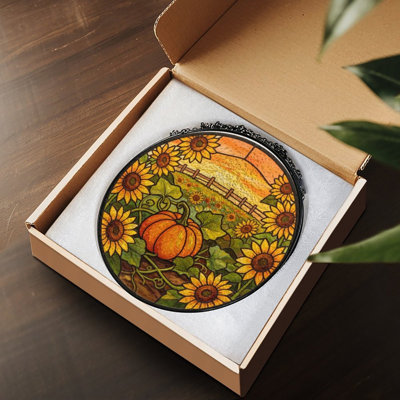 Tournesols et citrouille dans un champ d'automne