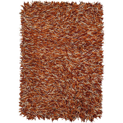 Tapis à poil long contemporain tissé à la main Cyrah en rouge / orange / ivoire