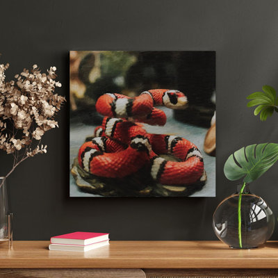 Figurine de serpent rouge et blanc - peinture sur toile tendue