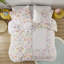Housse de couette simple avec fonction réversible et motifs floraux brillants