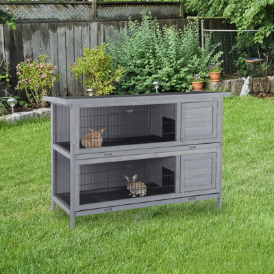 Maison pour petits animaux en bois avec cage verrouillable, plateau sans fuites et toit imperméable pour l'extérieur / intérieur PawHut