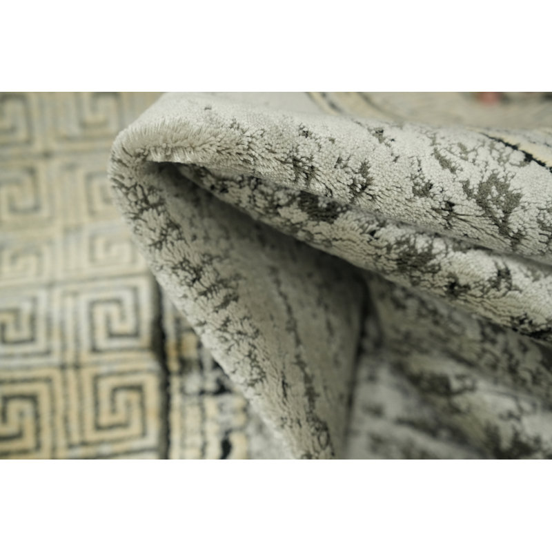Tapis vert et gris aux tons neutres 5 x 8