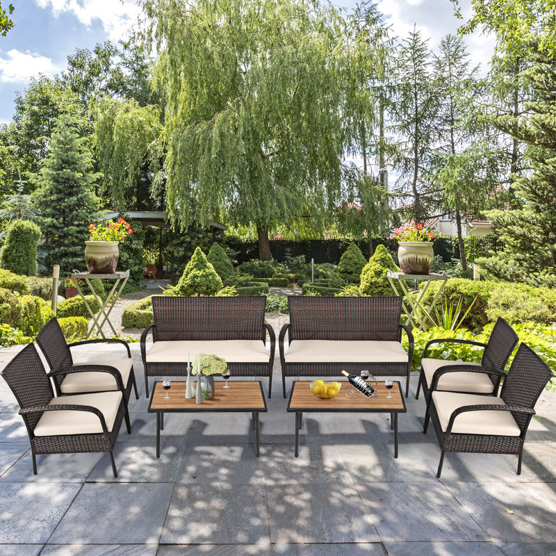 Pranet Rattan 4 - Person Seating Group with Cushions
