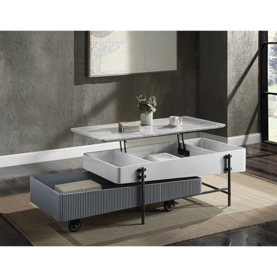 Table basse contemporaine grise et blanche avec système de rangement efficace