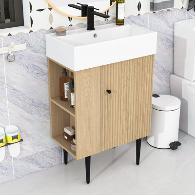 Ensemble de meuble-lavabo de salle de bain avec lavabo en céramique, rangement à gauche et pieds dorés