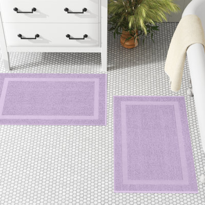 Tapis de bain Clous