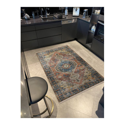 Tapis décoratif bleu à motif traditionnel