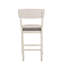 Ensemble de charmantes chaises de salle à manger rembourrées à hauteur de comptoir, parfaites pour des expériences culinaires élégantes et confortables.-628917168