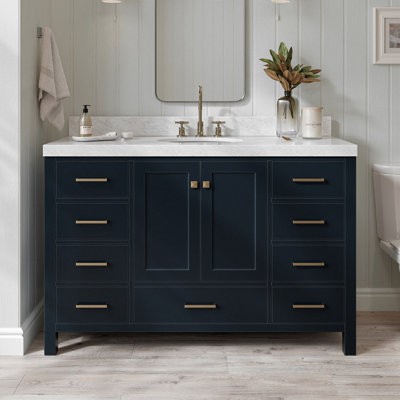 Meuble-lavabo simple Cambridge 54 po en bois massif bleu nuit, avec comptoir en marbre de Carrare de 2 po et lavabo ovale centrale.