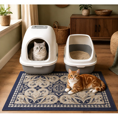 Blue 33 x 22 in high-density PVC litter trapping mat with waterproof, non-slip backing; the litter box catcher is soft on kitty paws, washable for easy cleaning, and intended as a pet supply.