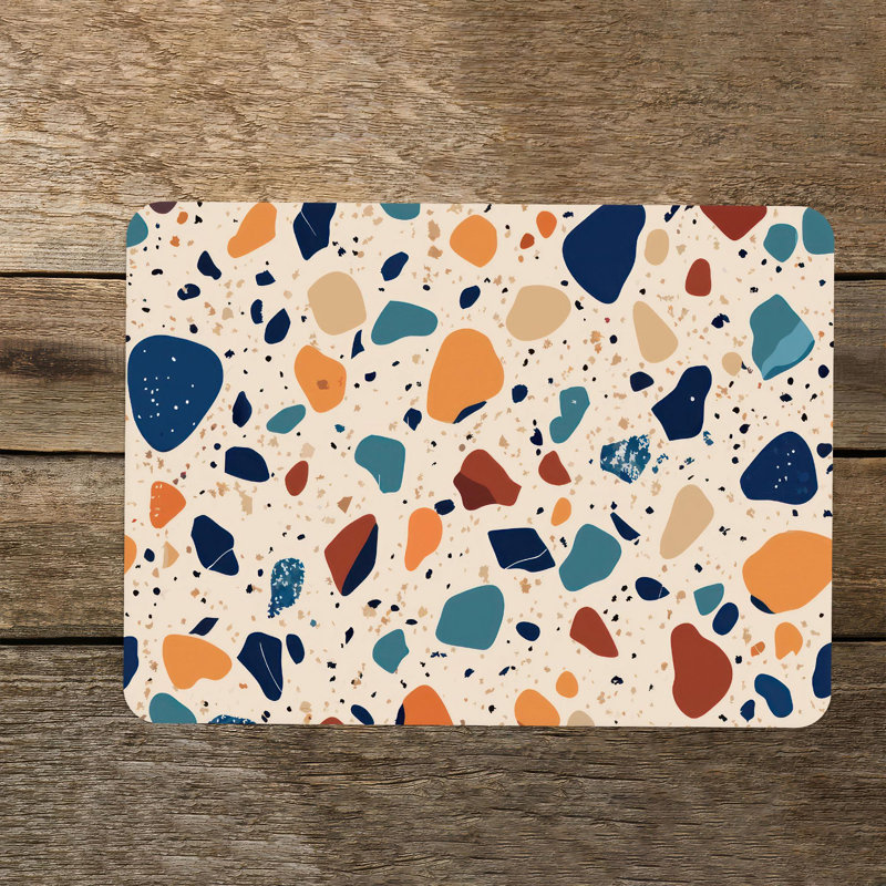 Planche à découper en verre au motif terrazzo vibrant, idéale pour décorer une cuisine ou une salle à manger moderne