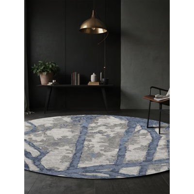 Tapis gris soyeux et moelleux