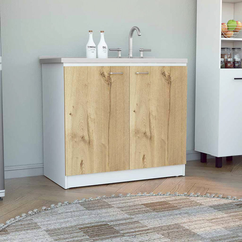Évier utilitaire avec armoire, une étagère, armoire à deux portes