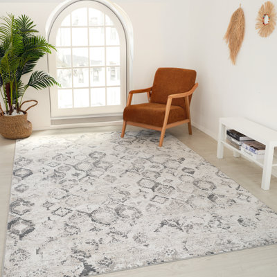 Tapis rectangulaire Kennika avec envers antidérapant