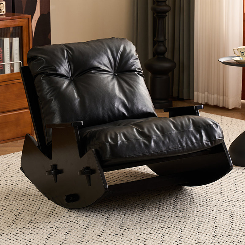 Chaise berçante en bois massif et cuir huilé